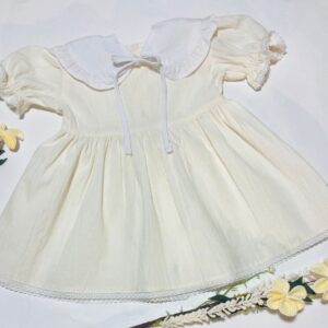 vestido manteca con cuello